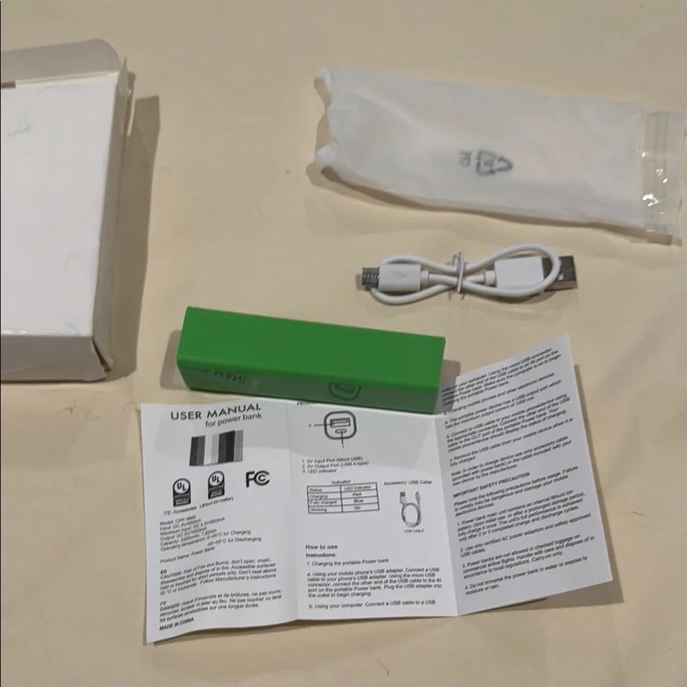 Green and White Charger with Portable Battery Pack for Cell Phones